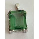 Beautiful 5 carat EMERALD PENDANT . Lab made and set in an attractive SILVER MOUNT. Having marking