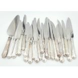 A Selection of 23 Sterling Silver Cutlery Knives. From the same Sheffield maker. Hallmarks on