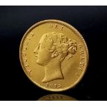 An Antique Victorian 1875 22k Gold Half Sovereign. Young head, shield back. EF condition but