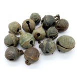 A Collection of 13 Medieval and Post Medieval Bronze Crotal Bells. 11 with original ball.