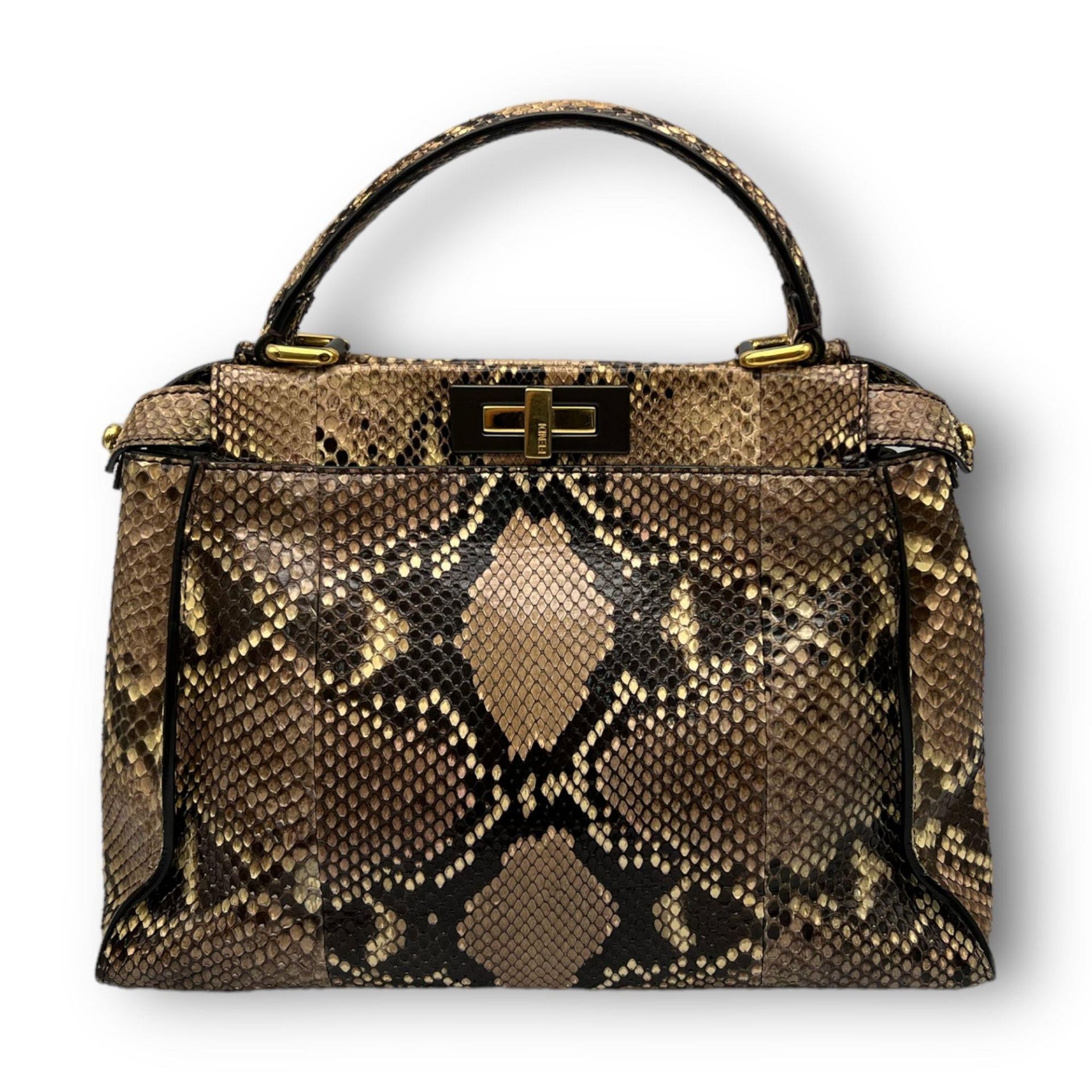 A Fendi Python Leather Hand/Shoulder bag. Attachable shoulder strap. Gold-tone hardware. Textile and - Bild 2 aus 8