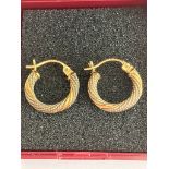 Pair of 14 carat GOLD HOOP EARRINGS with attractive Silver rope detail. 1.34 grams.