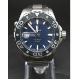 A Tag Heuer Aquaracer - Calibre 5 Automatic Gents Watch. Stainless steel strap and case - 44mm. Blue
