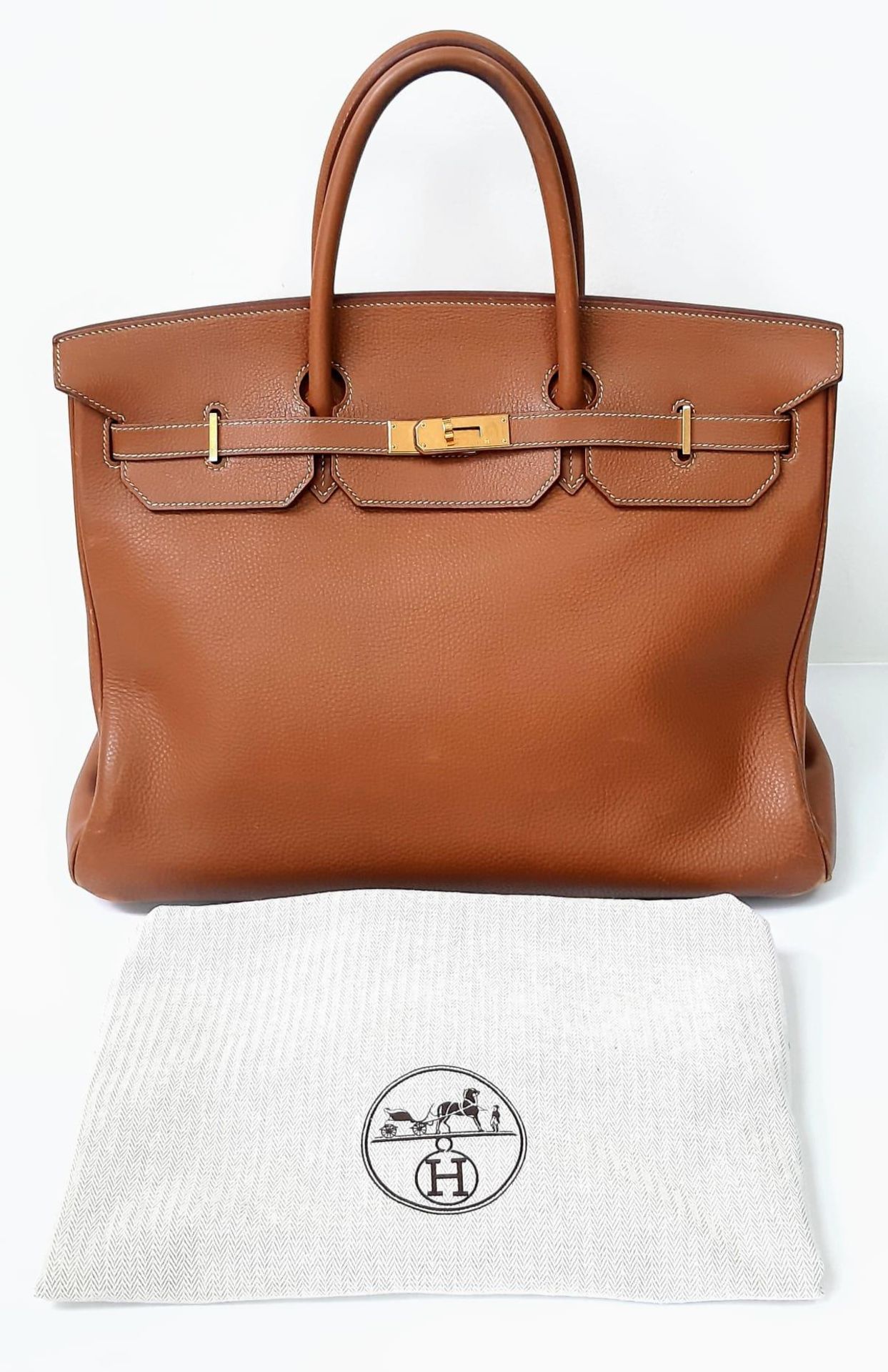 A Hermes Birkin Brown Leather Tote Bag. Handcrafted from the highest quality leather by skilled