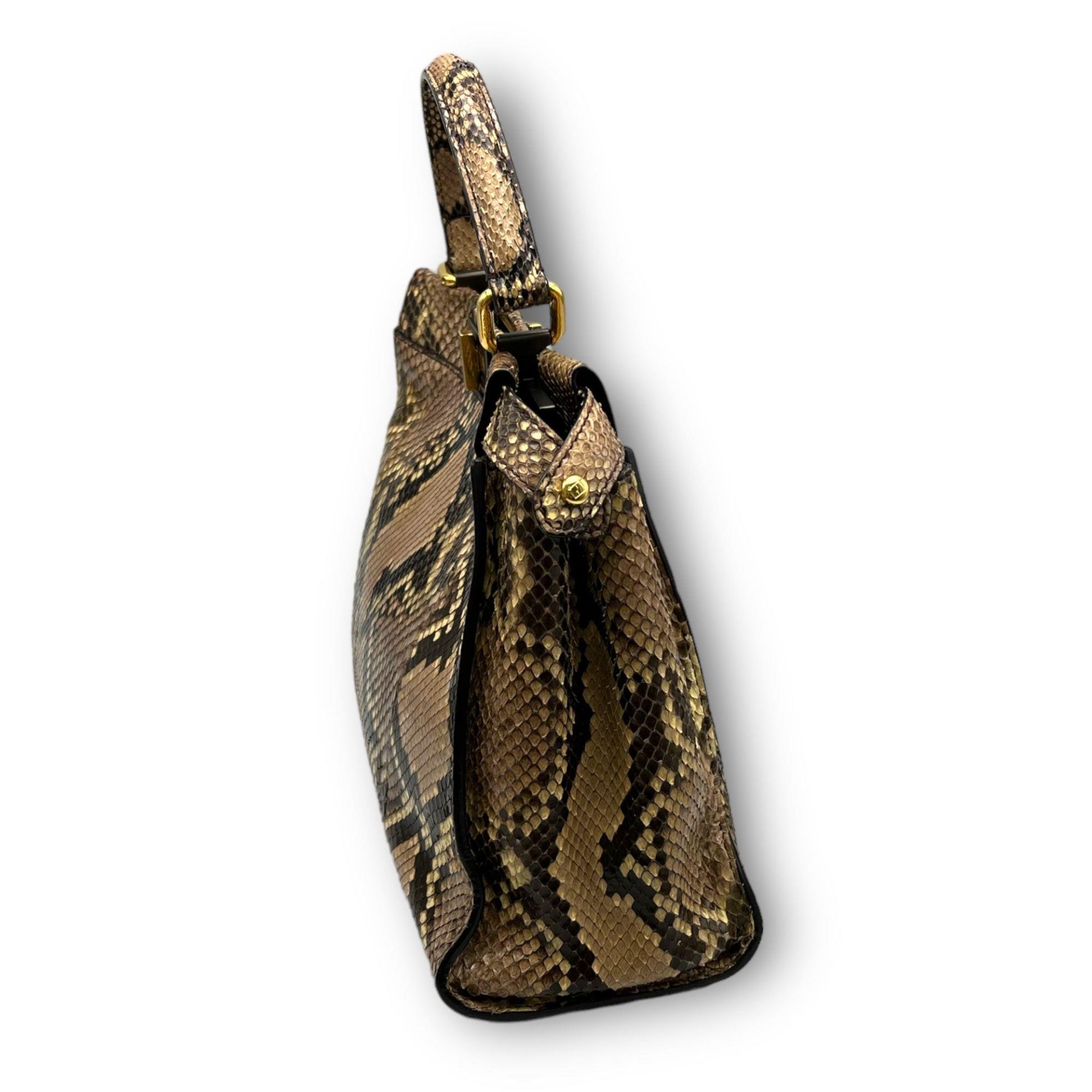 A Fendi Python Leather Hand/Shoulder bag. Attachable shoulder strap. Gold-tone hardware. Textile and - Bild 5 aus 8