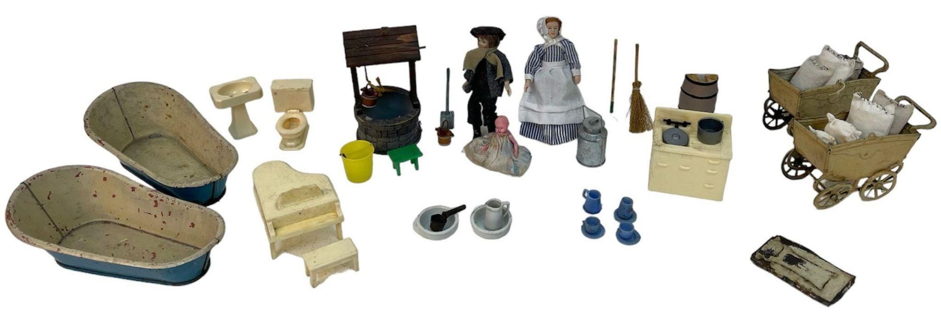 A collection of mixed dollhouse accessories.