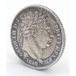 An 1826 George IV Silver Shilling Coin. High grade but please see photos.