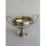 Antique SILVER SUGAR BOWL with octagonal base and trophy handles. Clear hallmark for Cornelius