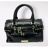 A Burberry Black Leather Stud Handbag. Adjustable studded shoulder strap. Gold-toned hardware. Three