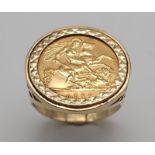 22k yellow gold half sovereign coin, dated 1982 with Queen Elizabeth, set into a 9k yellow gold ring