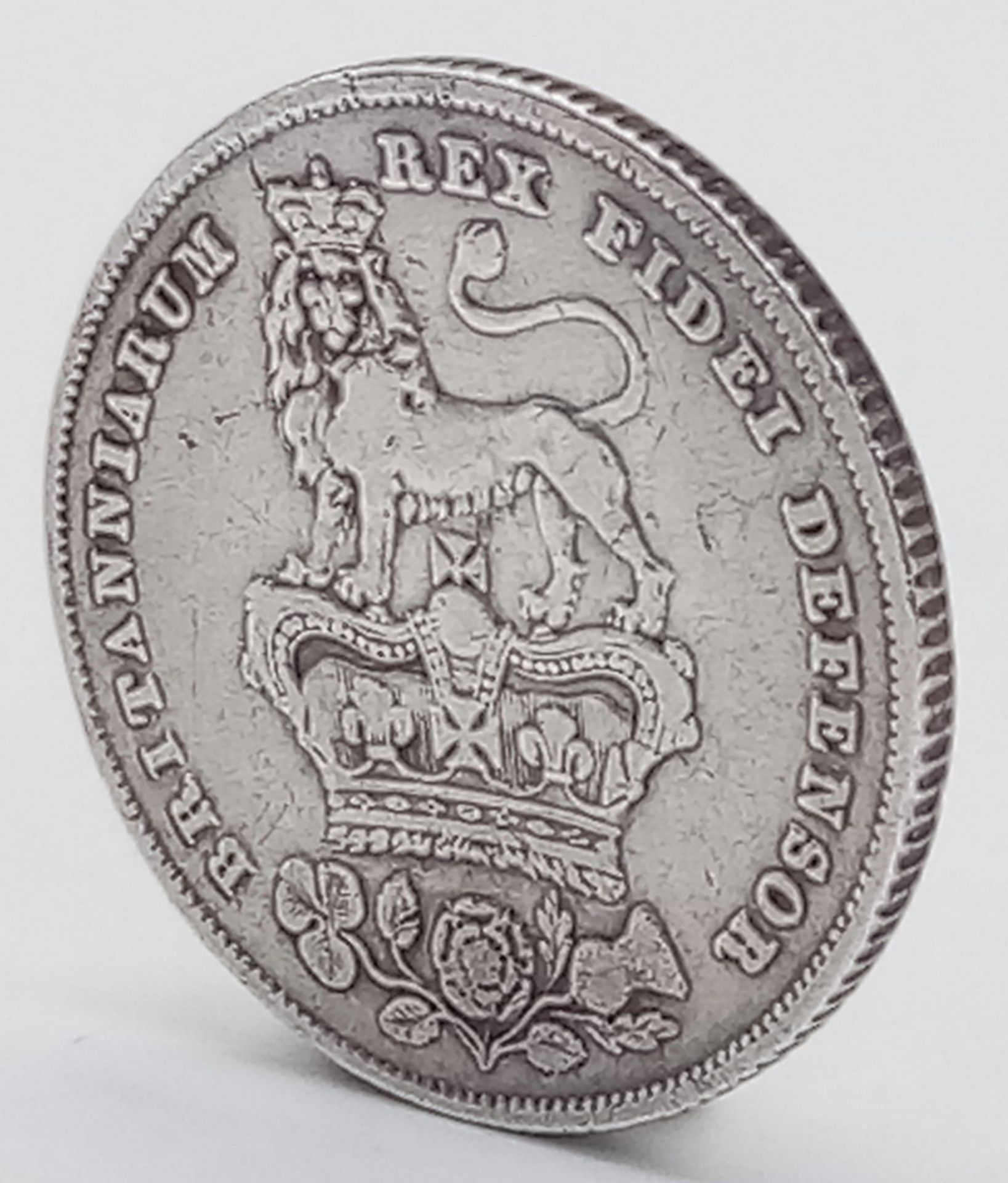 An 1816 George III British Silver Sixpence Coin. A decent grade but please see photos. - Image 4 of 10