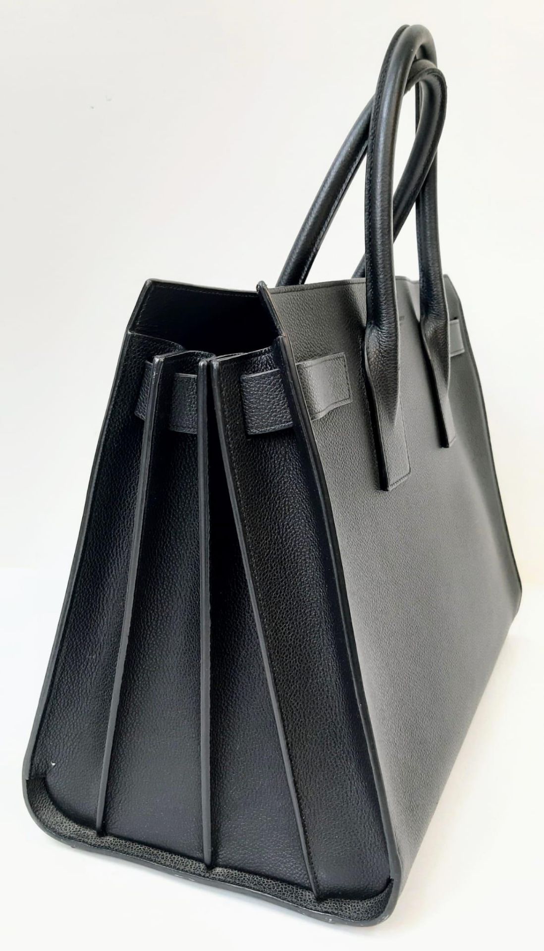 A Classy YSL Black Leather Sac de Jour Tote Bag. Textured calf leather exterior with twin handles. - Bild 2 aus 8