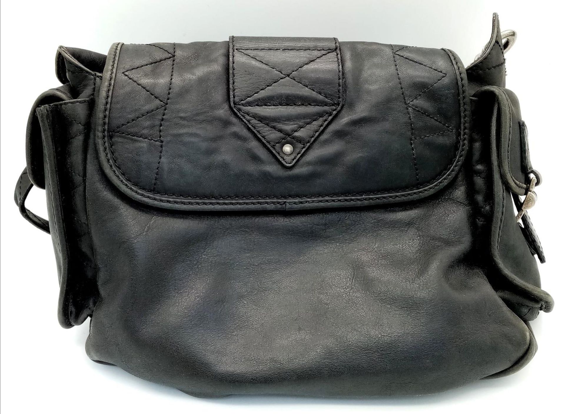 A Christian Dior Black Leather Handbag. Silver tone hardware. Chunky clasp lock. Two exterior side - Bild 7 aus 7