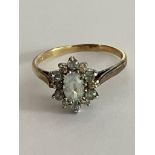 Vintage 9 carat GOLD,AQUAMARINE and DIAMOND RING. Complete with ring box. 2.08 grams. Size O 1/2.