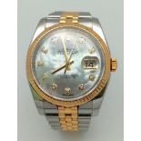 A Rolex Bi-Metal Oyster Perpetual Datejust Ladies Watch. Bi-metal strap and case - 37mm. Mother of