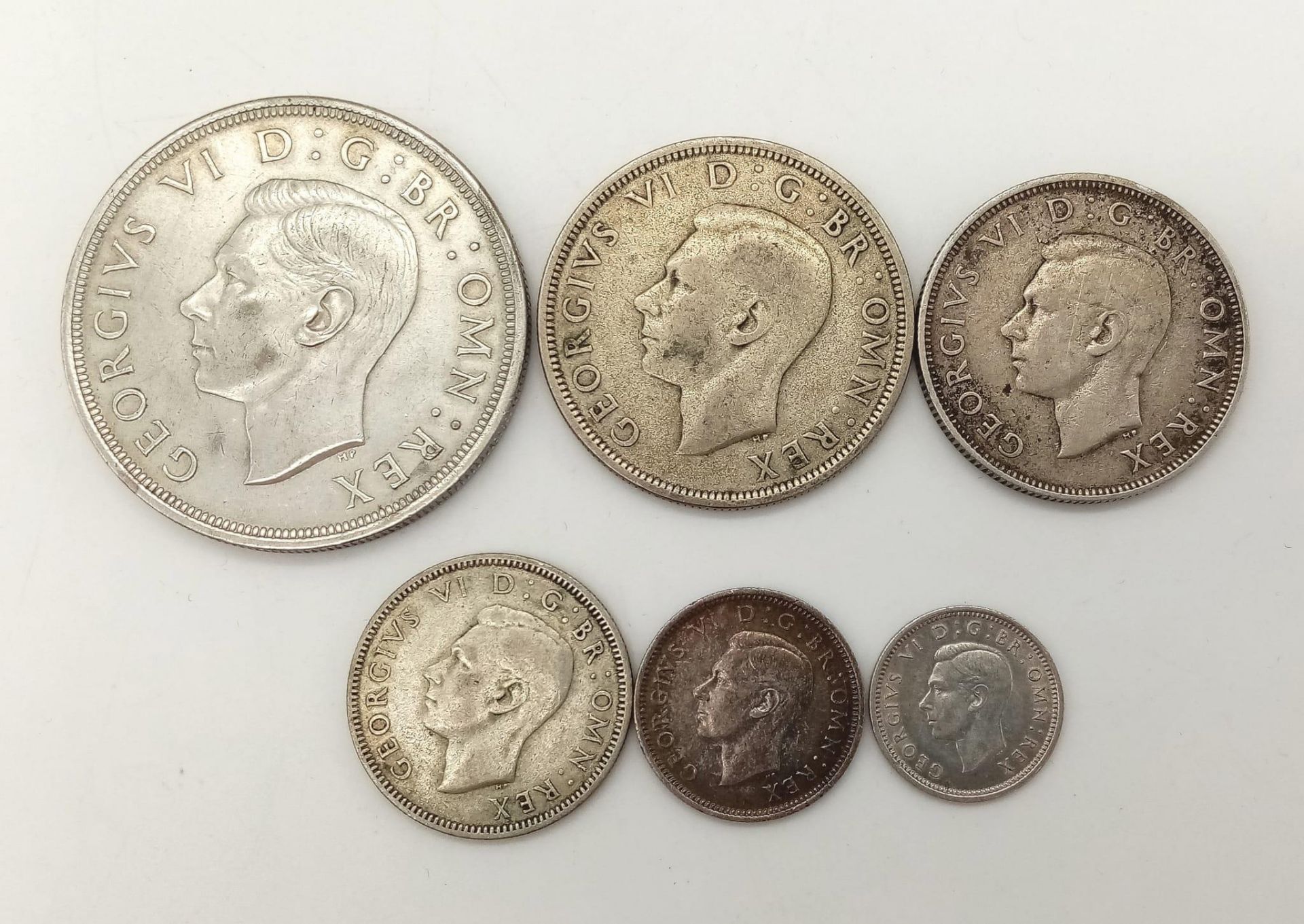 A Full Set of 1937 Silver British Coins Comprising: A Crown (Mint State), Half Crown (Very Fine),