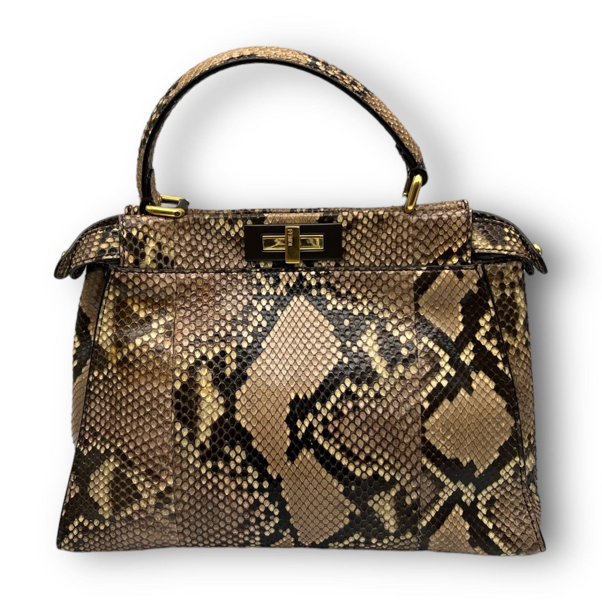 A Fendi Python Leather Hand/Shoulder bag. Attachable shoulder strap. Gold-tone hardware. Textile and - Bild 4 aus 8