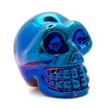 A Quartz Skull Figure with A metallic Blue Coating. The perfect cabinet of curiosity ornament or