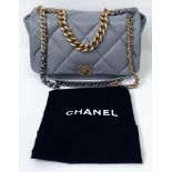 A Chanel 19 Maxi Grey Leather Flap Bag. Soft quilted leather exterior. Two tone furniture. Chanel