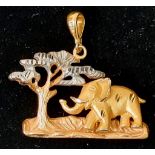 A Beautiful 18k Yellow and White Gold Elephant in the Serengeti Pendant. 5.2g. 2.5cm x 3cm.