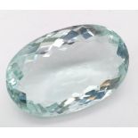A very admirable, large (140 carats), light blue topaz, oval cut, lab created, with excellent colour