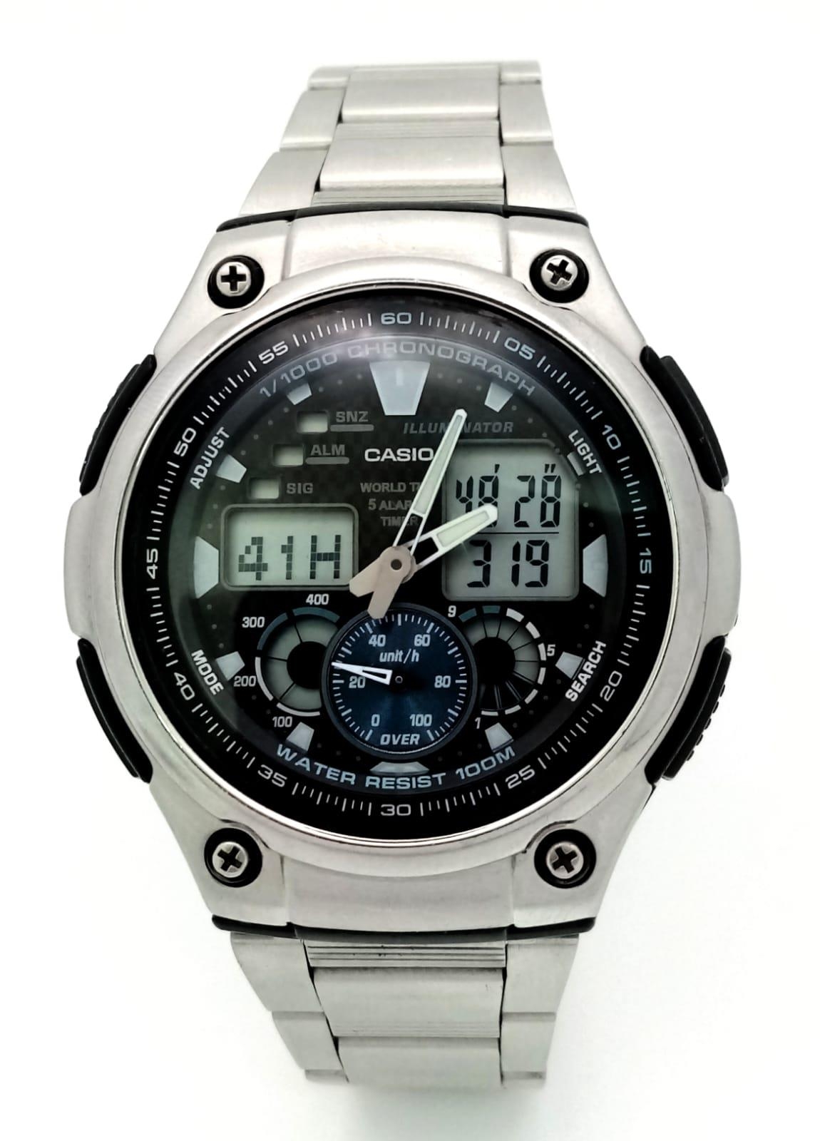A Casio World Time Five Alarm Watch. Stainless steel strap and case - 45mm. Black dial with - Image 2 of 11