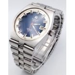 A Vintage Tissot Automatic PR 516 Gents Watch. Stainless steel strap and case - 36mm. Blue dial with