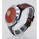 A Rare Vintage Lucerne Jump Watch. Burgundy leather strap. Case - 33mm. Red dial with jump window.