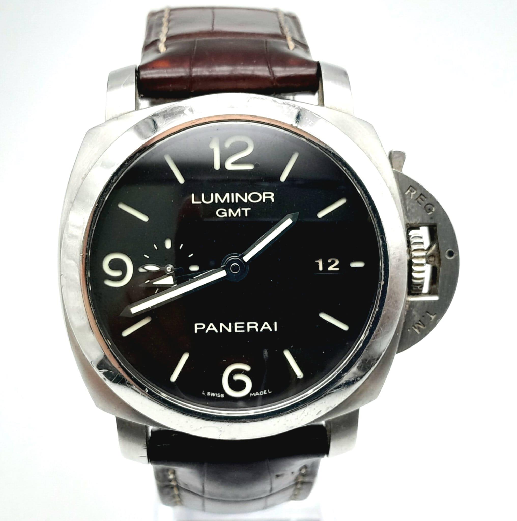 A "PANERAI LUMINOR GMT" WITH SKELETON BACK IN STAINLESS STEEL, A VERY SOUGHT AFTER PRESTIGE WATCH!