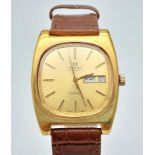 A Classic Omega Geneve Automatic Gents Watch. Brown leather strap. Two tone case - 36mm. Gold tone