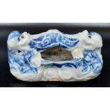 An 18th Century Chinese Blue and White Scholar's Brush Washer - Foo Dog at Both Ends. 9cm.