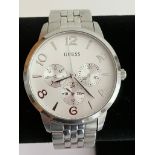 Gentlemans GUESS QUARTZ WRISTWATCH Multi dial model finished in silver tone stainless steel.