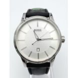 A Hugo Boss 'Hole in One' Gents Watch. Black rubber strap. Stainless steel case - 44mm. Silver