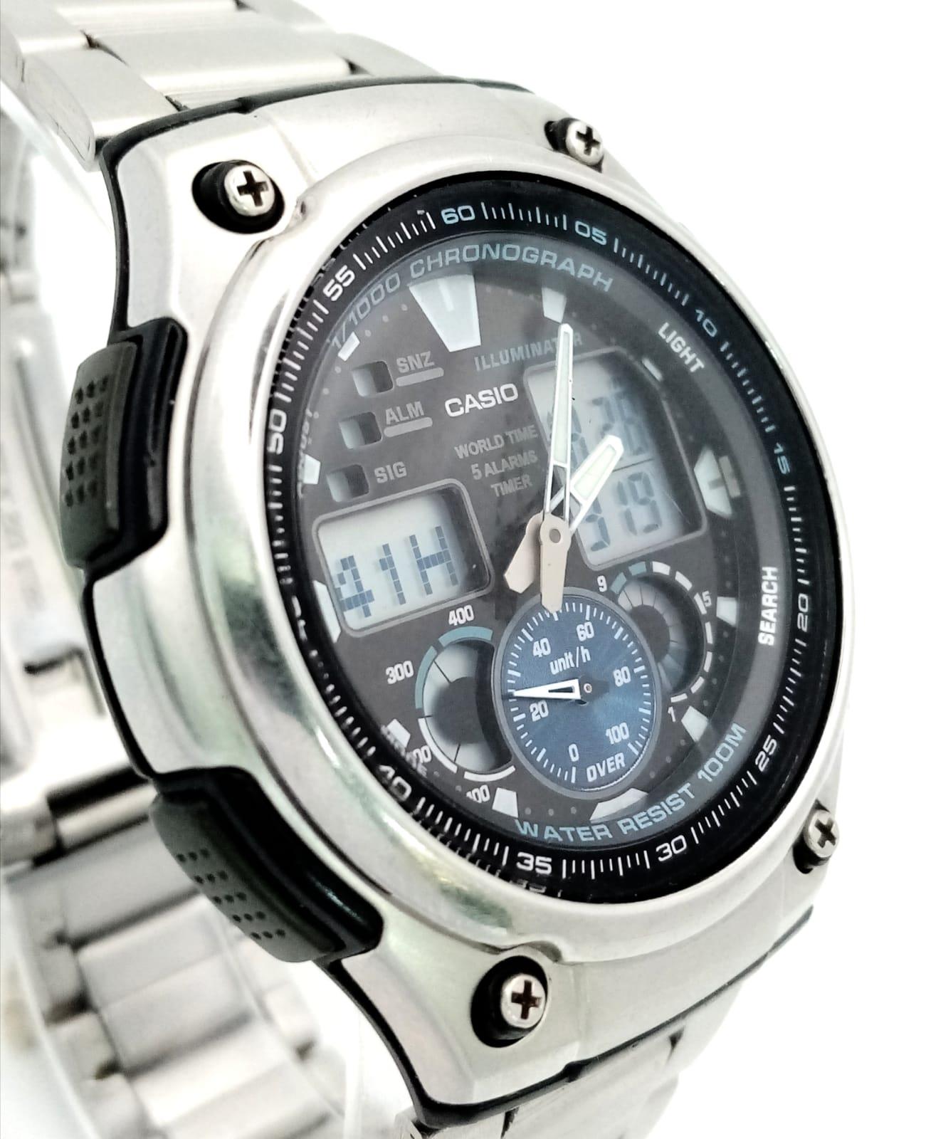 A Casio World Time Five Alarm Watch. Stainless steel strap and case - 45mm. Black dial with - Image 5 of 11