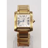 18K Solid Gold Cartier Tank Francaise Gents Watch. 18K Gold Case - 35 x 28mm. Automatic movement.