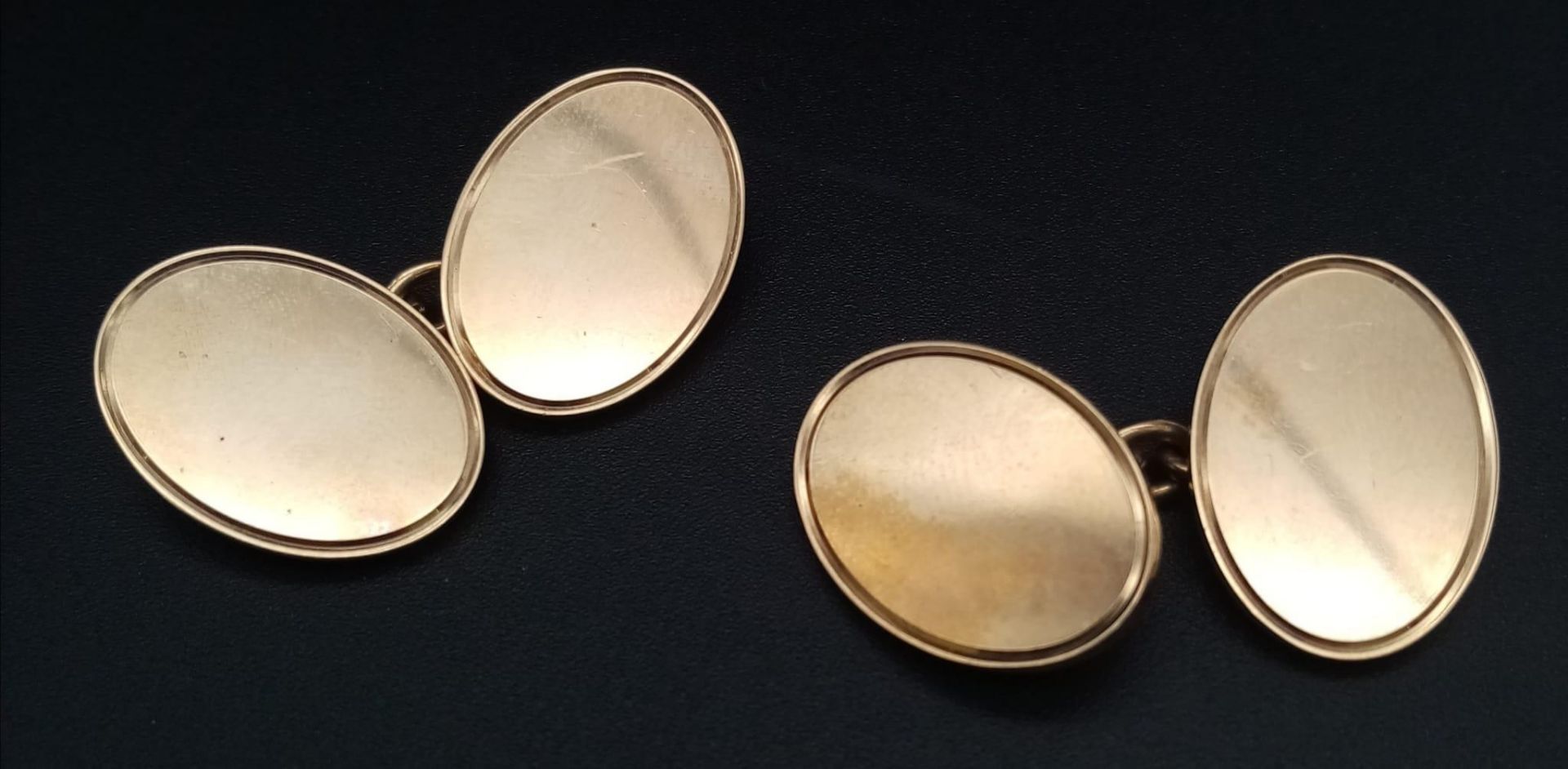 A Pair of Classic 9K Yellow Gold Oval Cufflinks. 15.42g total weight.