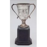 THE CAMERON QUAICH SILVER CUP FROM 1ST JUNE 1935 ON PLYNTH STANDING 11cms TALL TOTAL WEIGHT 88.4gms