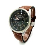 A Citizen Eco Drive Gents Watch. Brown leather citizen strap. Stainless steel case - 45mm. Black