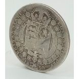A 1890 Victoria Silver Coin. Please see photos for condition.