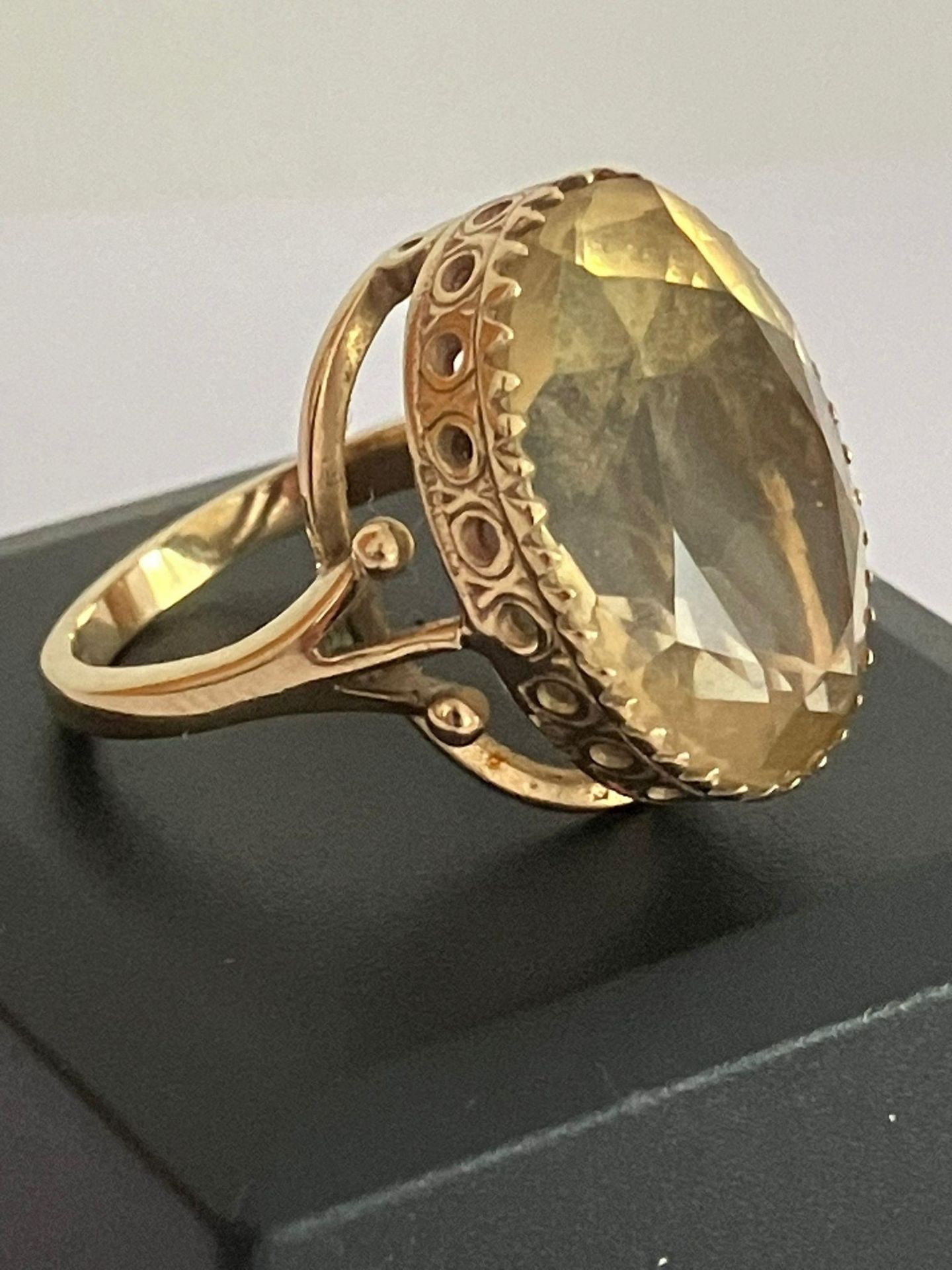 Fabulous 8 carat oval cut CITRINE set in a 9 carat yellow GOLD RING. The ring having a beautiful