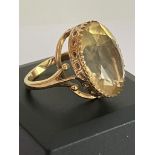 Fabulous 8 carat oval cut CITRINE set in a 9 carat yellow GOLD RING. The ring having a beautiful