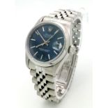 A Rolex Oyster Perpetual Datejust Ladies Watch. Stainless steel bracelet and case - 31mm. Metallic