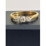 18 carat yellow GOLD and DIAMOND RING, Having three sparkling clear white DIAMONDS (0.29 carat)