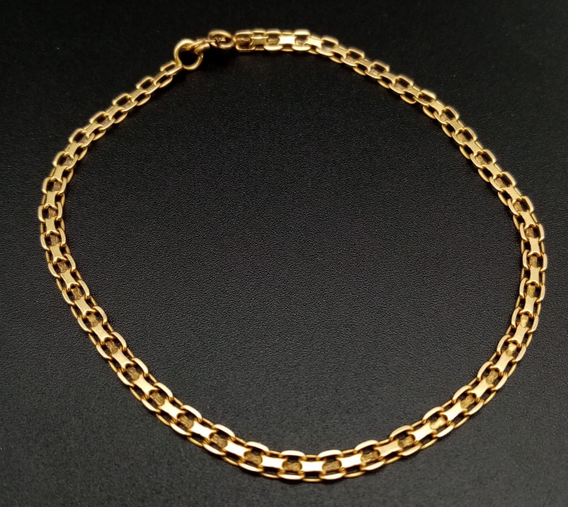 An 18k Yellow Gold Delicate Link Bracelet. 18cm. 2.97g