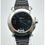 A CHOPARD "HAPPY SPORT" LADIES WATCH WITH 3 FLOATING DIAMONDS IN STAINLESS STEEL WITH ORIGINAL