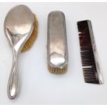 An Antique Sterling Silver Hair, Clothes Brush and Comb Set. Hallmarks for Birmingham 1919. Makers