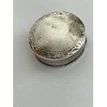 Vintage SILVER PILL BOX in circular form with decorated border. Hallmark on base.