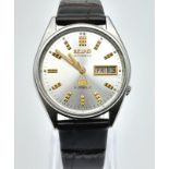 A Vintage Seiko 21 Jewel Automatic Gents Watch. Burgundy leather strap. Steel case - 35mm. Silver