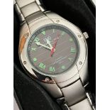 HMO SOLAR POWERED WRISTWATCH Finished in stainless steel with attractive green digits and a sweeping