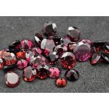 A Parcel of 34 Round Cut Mozambique Garnets, Assorted Sizes. 25.06 Total